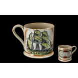 Staffordshire Mug, ship decoration to front, with verse 'When riding o'er the Mountain wave, The