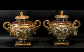 A Pair of Decorative Gilt Embellished Centre Pieces comprising of two twin handled jardinieres and