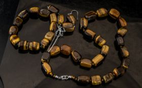 A Silver Tiger's Eye Necklace with lobster lock (425 cts) with matching silver hook Tiger's Eye