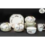 'New Chelsea' Tea Service, comprising twelve cups and saucers, twelve side plates,