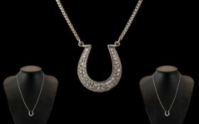 18ct White Gold - Attractive Diamond Set Horseshoe Pendant, Attached to a 18ct White Gold Chain.