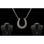 18ct White Gold - Attractive Diamond Set Horseshoe Pendant, Attached to a 18ct White Gold Chain.