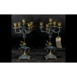 A Pair of Italian Five Branch Candlesticks c 1960 metal with gilt decoration, the central body