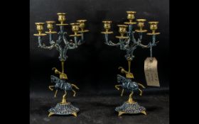 A Pair of Italian Five Branch Candlesticks c 1960 metal with gilt decoration, the central body