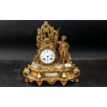 A French Gilt Metal Mantle Clock, white porcelain dial, Roman numerals, surmounted with a well