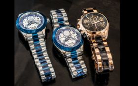 Three Gentlemen's Fashion Watches, comprising two blue and chrome watches,