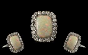Antique Period - Platinum Set Superb Quality Diamond and Opal Set Dress Ring. The Rectangular Shaped