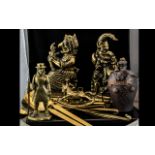 A Collection of Brass Ware to include, Punch and Judy door stops, a figure of a brass guardsman,