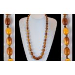 Early 20th Century Superb Graduated Butterscotch Amber Beaded Necklace. Excellent Colour and Grain.