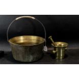 Brass Pestle 7 Mortar Set, together with a brass cauldron with handle, 12" diameter x 14" tall.