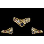 Ladies - 18ct Gold Ruby, Diamond and Sapphire Set Wishbone Ring. Marked 750 - 18ct to Interior of
