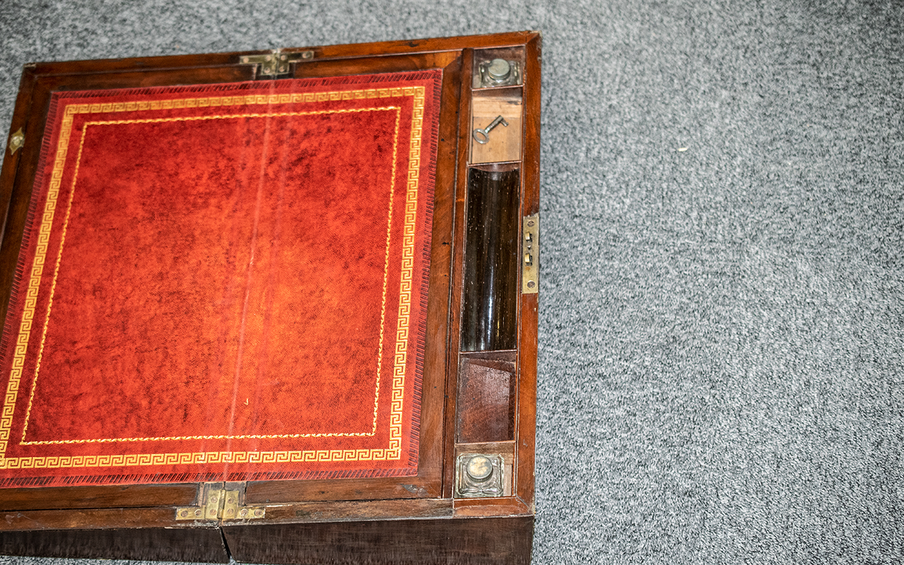 A Walnut Travelling Writing Slope red leather interior, brass Strapwork in edges. - Image 3 of 3