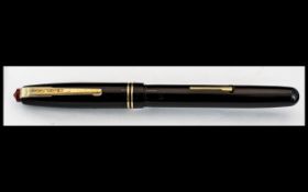 1950's Waterman's Fountain Pen, with a 14ct W-2A gold nib. Black with gilt trim.