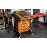 A Victorian Walnut Davenport of typical form. Fall front with fitted interior. Four drawers and