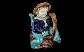 Manx Isle of Man Majolica Tea Pot, marked to base, three legged sailor sitting on a coil of rope.