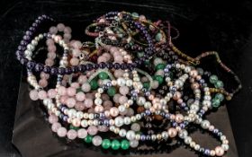 A Collection of 14 Beaded Necklaces, assorted colours and lengths, comprising pearls, beads,