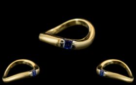 18ct Gold - Contemporary Designed Single Stone Sapphire Set Ring. Full Hallmark for 750 - 18ct.