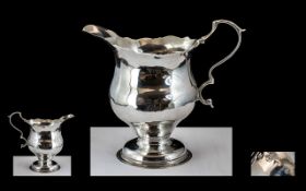 Early George III Helmet Shaped Sterling Silver Cream Jug of Small Proportions.