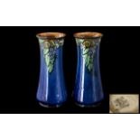 Two Royal Doulton Stoneware Vases, Fruit bouquet with a blue glaze body.