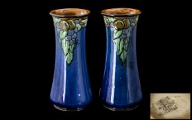 Two Royal Doulton Stoneware Vases, Fruit bouquet with a blue glaze body.