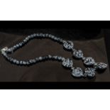 Snowflake Obsidian Pendant Necklace, comprising six heart shaped, carved and polished pieces of