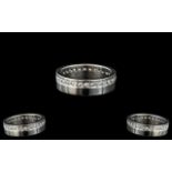 A Platinum Diamond Full Eternity Ring set with round, modern, brilliant cut diamonds.