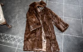 Ladies Full Length Dark Brown Mink Coat, fully lined in sateen fabric, with shawl collar and slit