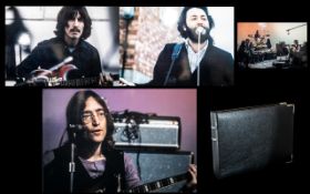 Beatles Interest - Album containing 24 photographs of the Beatles, A4 size.