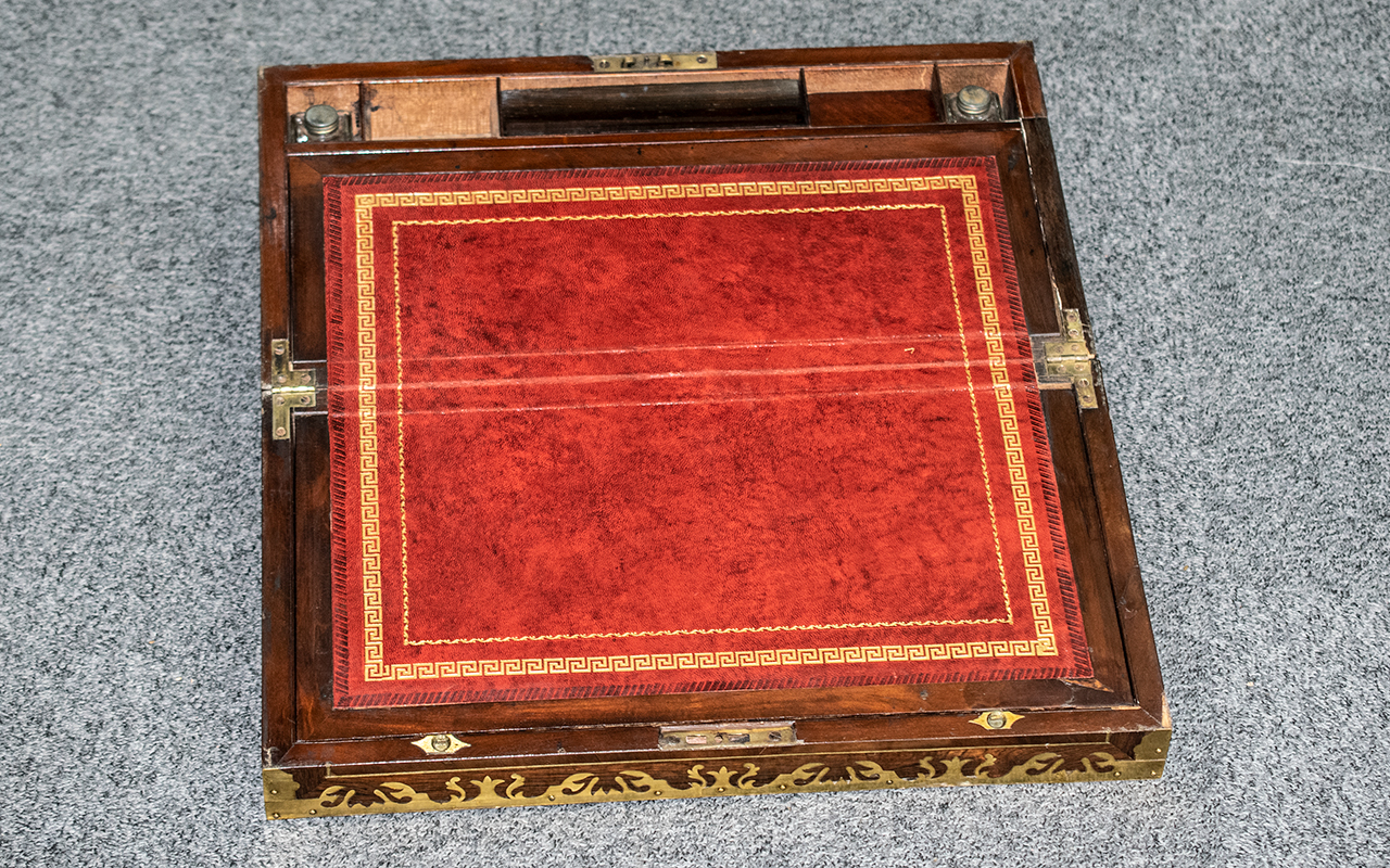 A Walnut Travelling Writing Slope red leather interior, brass Strapwork in edges. - Image 2 of 3