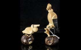Two Tagua Nut Amazonian Hand Made Figures, depicting an Eagle perched on a branch,