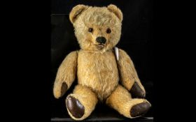 1940's Teddy Bear, jointed legs and arms, moveable jaw and head.