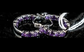 Amethyst Small Hoop Earrings, the oval cut,