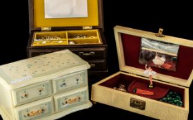 Three Jewellery Boxes Containing a collection of stone set and diamonte jewellery,