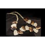 Ivory & Horn Heart Shaped Necklace with silver clasp