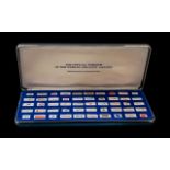 Franklin Mint Collection of 50 sterling silver and enamel colours of the official emblems of the