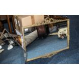 Decorative Gilt Edged Mirror, 24" x 29" with scroll and floral design.