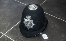 Policeman's Helmet, made by Compton Webb Headdress Limited, Witney. No. 57 915.