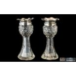 Pair of Cut Glass Vases with Silver fluted tops, fully hallmarked. Measure 6'' tall.