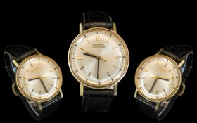 A Gents Bulova Accutron Wristwatch champagne dial, baton numerals, gold plated case.