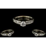 14ct White Gold - Superior Quality Diamond Set Dress Ring. The Central Round Modern Brilliant Cut