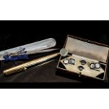 A Set of Art Deco Dress Studs and Cufflinks, in fitted case, together with a Parker fountain pen and