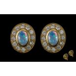 Antique Period - Attractive and Superb Quality Pair of Diamond and Opal Set Earrings of Oval Form.