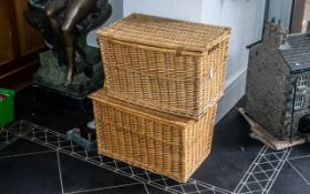 Two Wicker Laundry Baskets, strong and spacious, measure 22" length, 14" deep x 14" high.