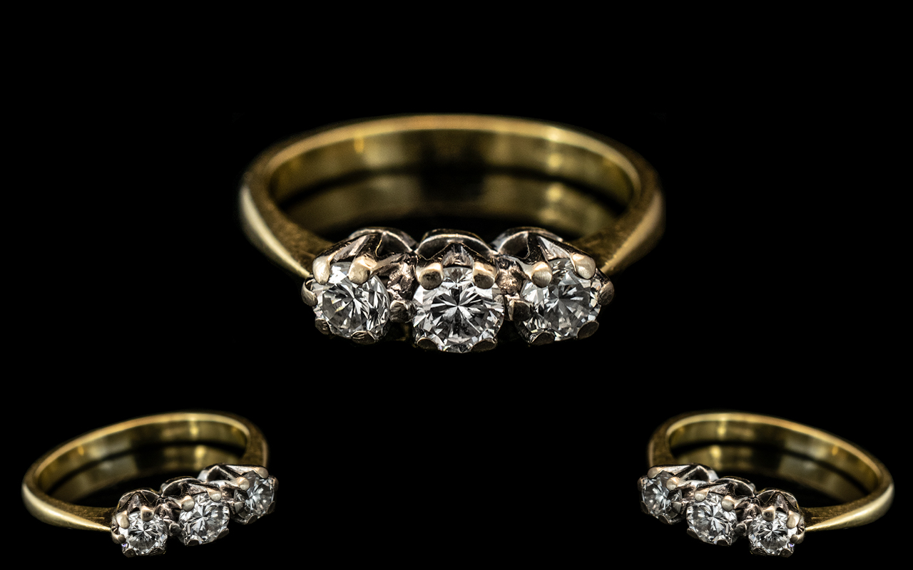 18ct Gold 3 Stone Diamond Ring set with round modern brilliant cut diamonds, estimated diamond