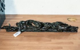 Bronze Figural Group depicting interlocking figures, length 20".