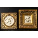 Two Reproduction Resin and Gilt Framed Wall Plaques Depicting Cherubs largest 14 inch squared.