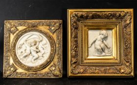 Two Reproduction Resin and Gilt Framed Wall Plaques Depicting Cherubs largest 14 inch squared.