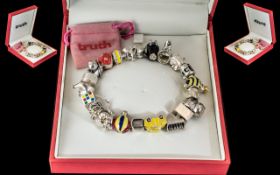Sterling Silver Charm Bracelet by 'Truth', loaded with modern charms including an owl, bee, piano,