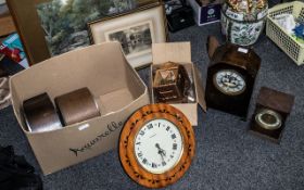 A Box Containing a Collection of Seven Clocks to include two 1920s mantle clocks,