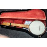 Maxitone Ukulele Banjo closed backed, in fitted case. Overall length 21''